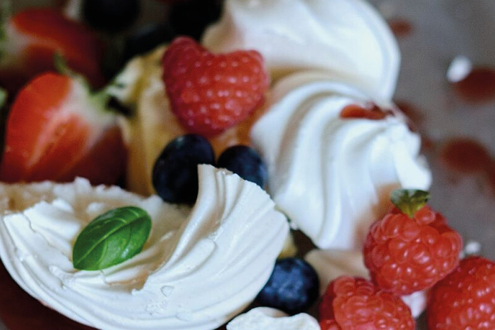 Pavlova dessert with fresh berries